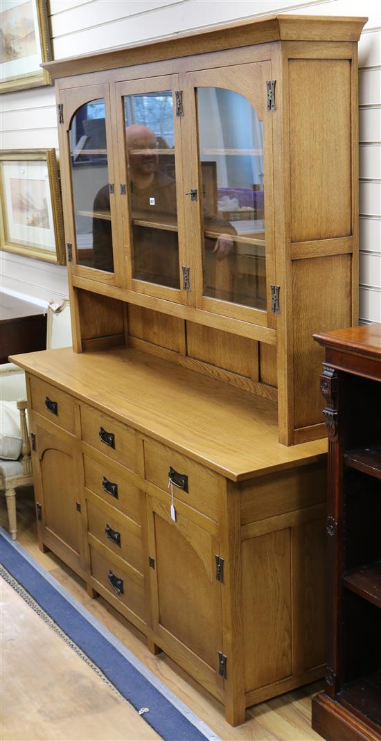 An Arts & Crafts style oak dresser W.171cm